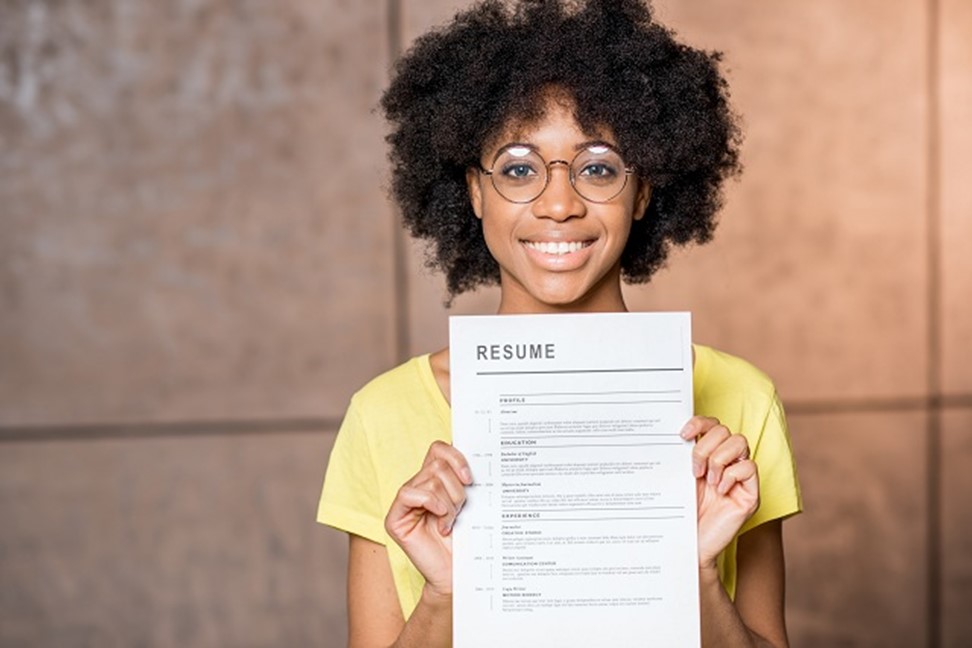 Create & Sell Your Resume; girl holding paper