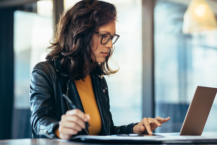 A career seeker uses a laptop to research new career and training options