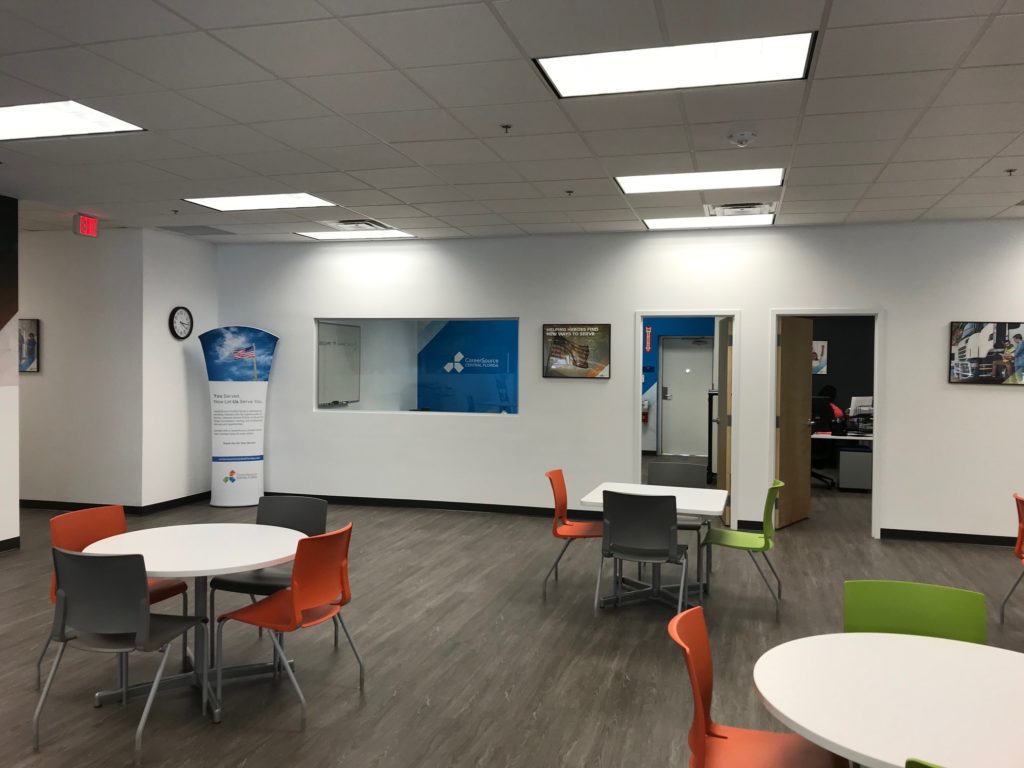 circle tables with orange and gray chairs at the Seminole Career Center 