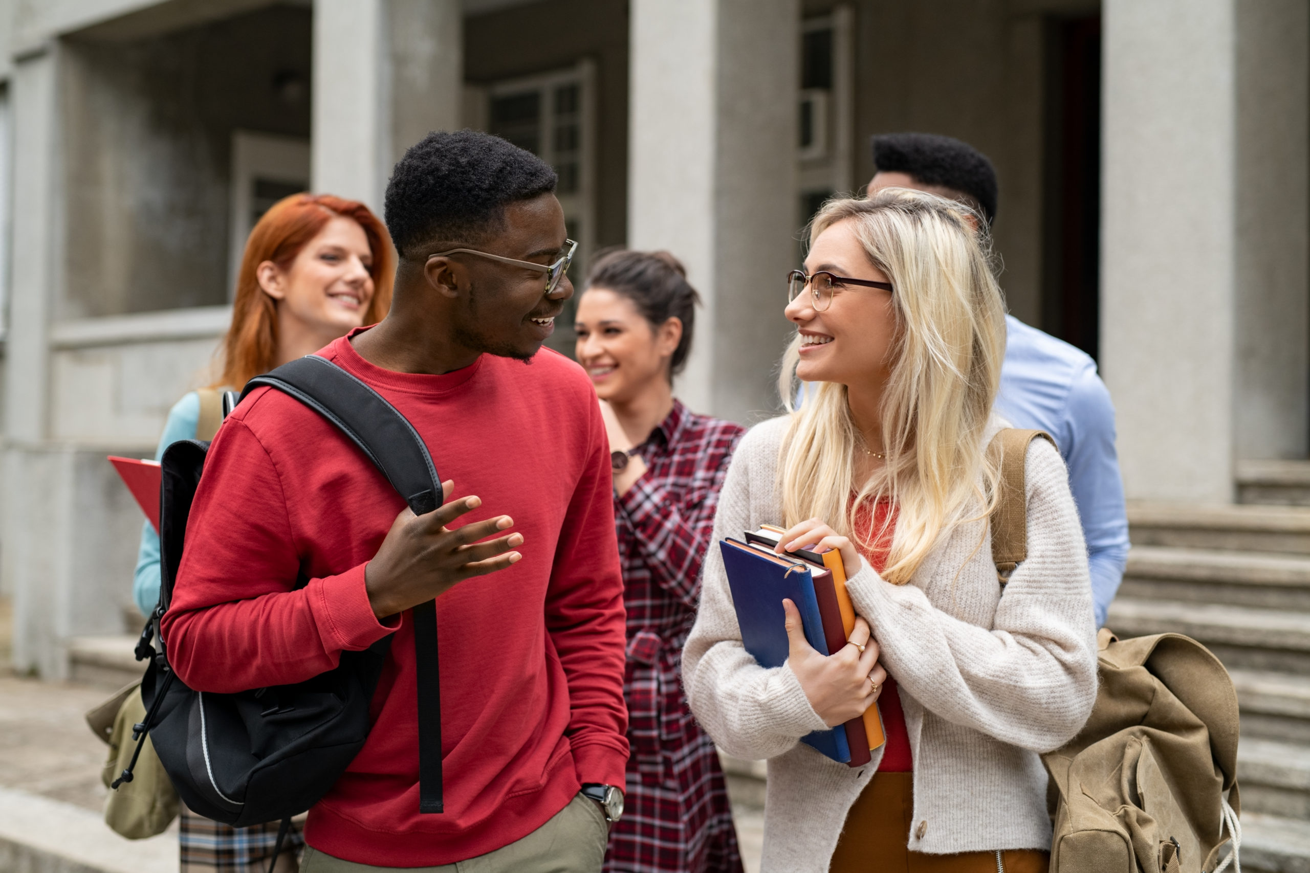 12 High School Hacks, students talking in front of school