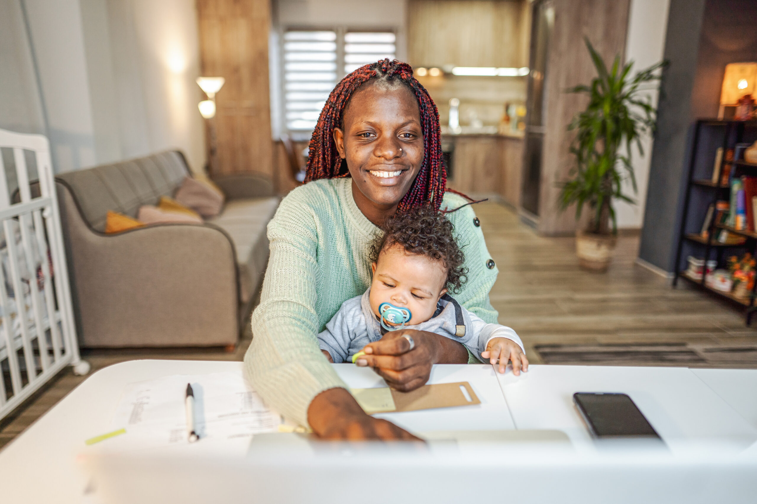 Hard-working black mother doing business from home